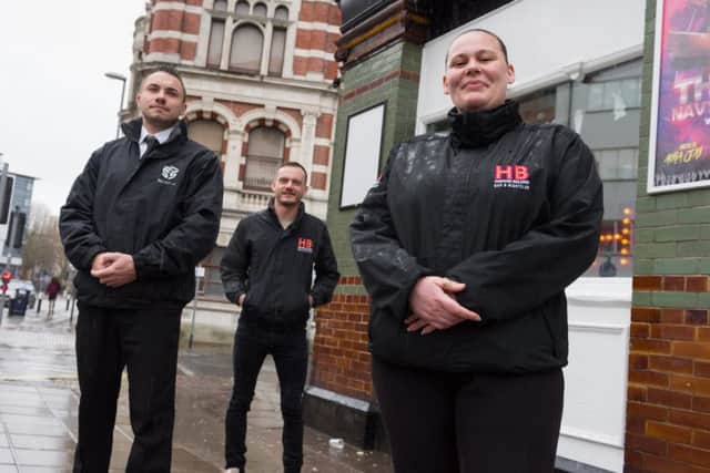 AJ Ashmore, front, who gave CPR to a critically-ill man for five minutes. She is pictured with Pete Brake, director of SNS security and Olly Grant, rear. Picture: Duncan Shepherd
