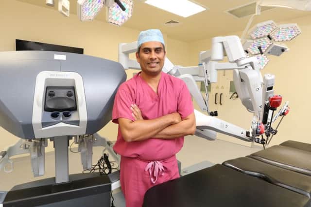 Surgeon Jim Khan and the Da Vinci robot at QA Picture: Habibur Rahman (171130-974)