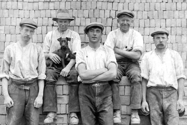 Here we see more of the men who made the bricks that formed our city. (Jim Randall.)