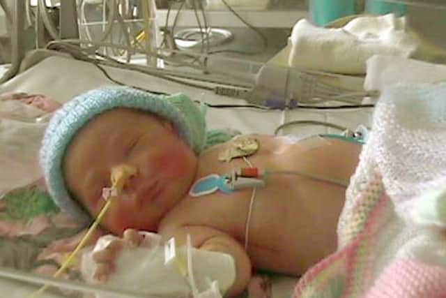 Jack Strange in hospital as a baby