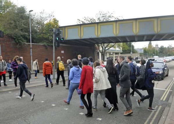 Students cross the Anglesea Road junction with Park Road in Portsmouth - this crossing is due to be removed