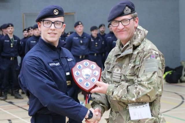 Captain Rob Vitali presents the Spartan Trophy to AB McQuillian