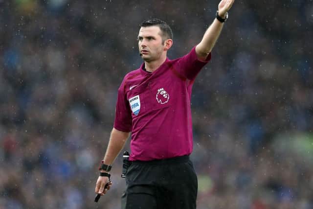 Referee Michael Oliver during the Premier League match at the AMEX Stadium, Brighton. Photo: Adam Davy/PA Wire.