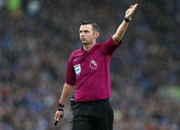 Referee Michael Oliver during the Premier League match at the AMEX Stadium, Brighton. Photo: Adam Davy/PA Wire.