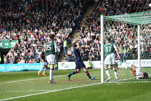 Zak Vyner clears off the line for Plymouth during Pompey's 0-0 draw at Home Park. Picture: Joe Pepler/ PinPep