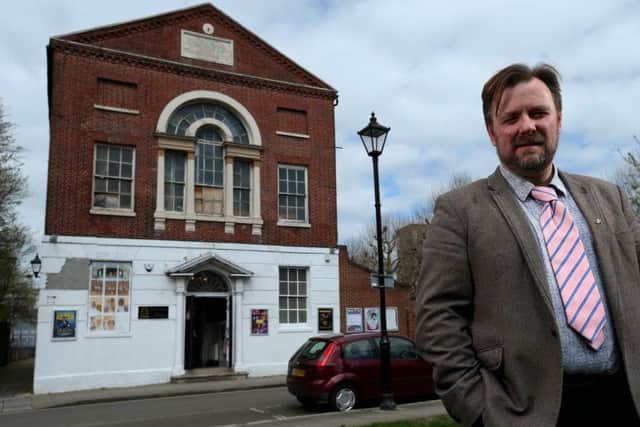 Artistic director Richard Stride at the Groundlings Theatre, Kent Street, Portsmouth, where a fundraising campaign is under way to renovate the facade     Picture: Chris Moorhouse