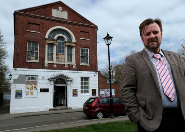 Artistic director Richard Stride at the Groundlings Theatre, Kent Street, Portsmouth, where a fundraising campaign is under way to renovate the facade     Picture: Chris Moorhouse