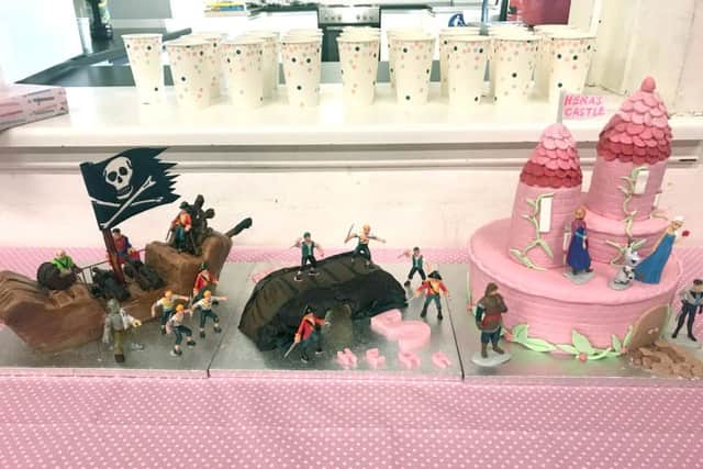 Hera Pharoah's superheroes, pirates and princesses birthday cake