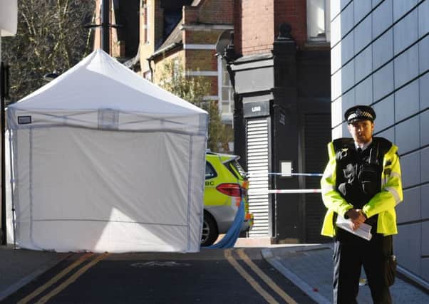 Police at the scene in Link Street, Hackney, east London after a man in his 20s died after being stabbed. Picture: Press Association