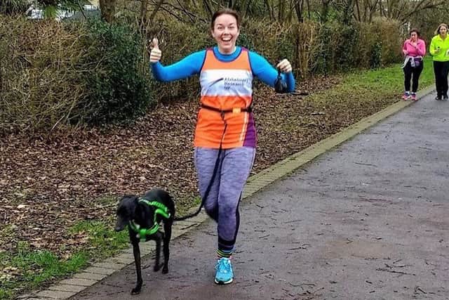 Leading Regulator Sophia Hurlo, who is based at HMS Collingwood in Fareham, with her dog Perry