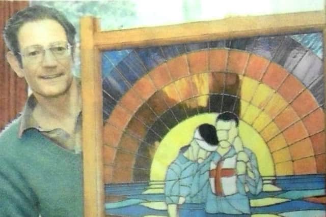 Lt-Cdr Ian Latimer with the stained glass window he made for Haslar Hospital