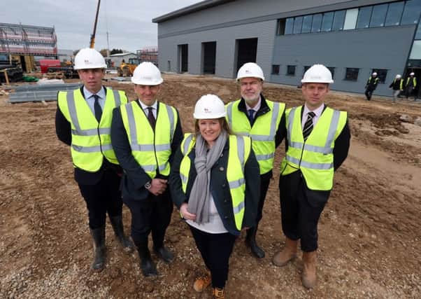 From left, Guy Jackson of Lambert Smith Hampton; Tom Hughes, director of Canmoor Developments; leader of Portsmouth City Council Cllr Donna Jones; Robin Dickens of Lambert Smith Hampton; and Nick Tutton of CBRE Picture: Chris Moorhouse