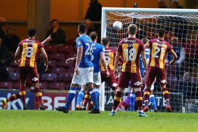 Pompey concede in the 14th minute at Valley Parade. Picture: Joe Pepler