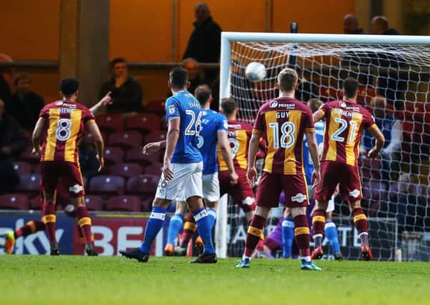 Pompey concede in the 14th minute at Valley Parade. Picture: Joe Pepler