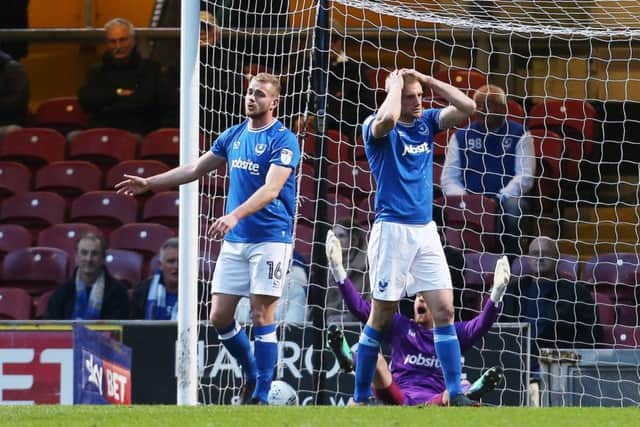 Jack Whatmough, Matt Clarke and Luke McGee show their frustration after Bradford opened the scoring. Picture: Joe Pepler