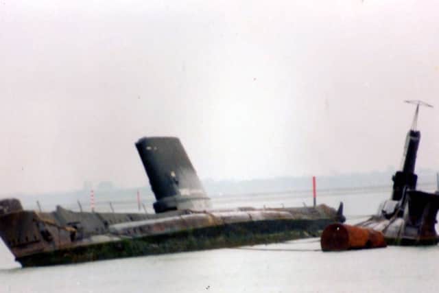 Abandoned and awaiting their fate, here we see the former HM Submarines Tiptoe, left,  and Artemis in Pounds yard, Portsmouth.  Picture: Roger Allen Collection