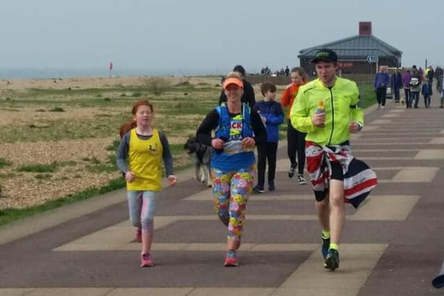 Victoria Wilson, Shyloe Wilson and Gavin Griffiths running on Southsea seafront