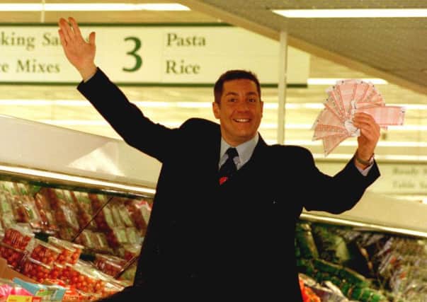 Dale Winton on the much-loved set of Supermarket Sweep. Credit: PA Wire