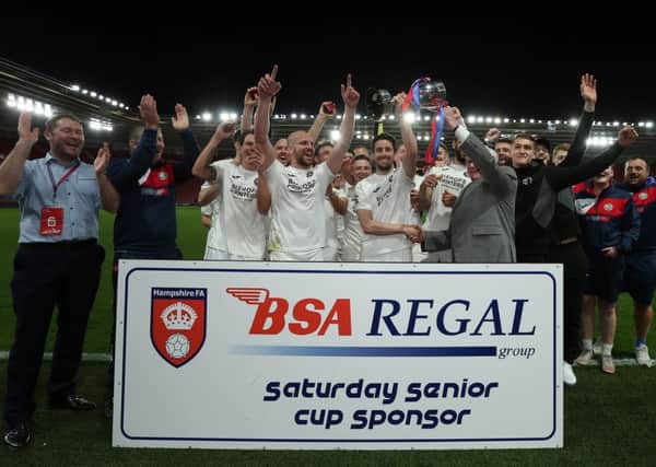 The Hawks toast their Hampshire Senior Cup triumph. Pictures: Chris Moorhouse