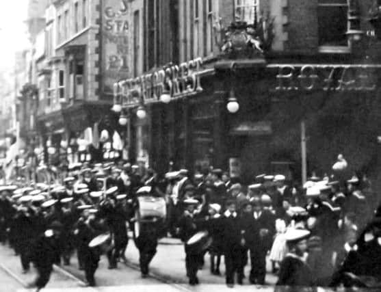 Pictured passing the Royal Sailors Rest in Commercial Road, Landport, we see what looks like a cadet band parading.   Picture: Robert James Collection