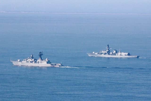HMS St Albans (background) with the Russian frigate Yaroslav Mudry (foreground)    Picture: PO Lee Blease