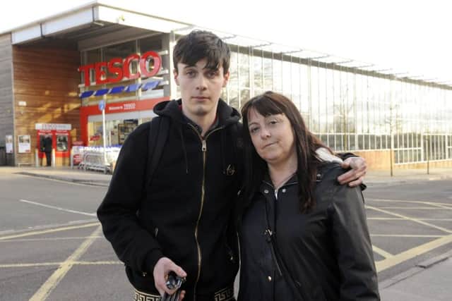 Kieran Chesters with his mum, Louise Batchelor at the Tesco store in Fareham                           Picture: Malcolm Wells (180237-2496)