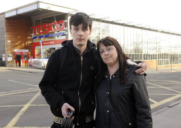 Kieran Chesters with his mum, Louise Batchelor at the Tesco store in Fareham                           Picture: Malcolm Wells (180237-2496)