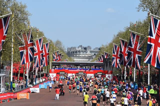 Runners make their way along The Mall towards finish line during the 2018 Virgin Money London Marathon