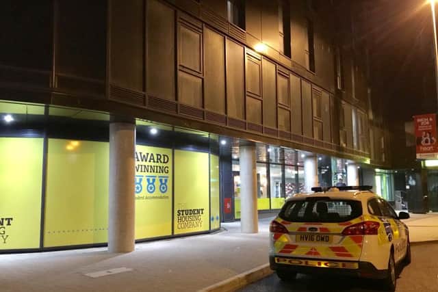 A police car parked outside Catherine House in Stanhope Road, Portsmouth, earlier tonight. Picture: Byron Melton