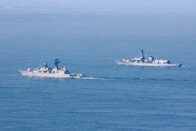 HMS St Albans (background) with the Russian frigate Yaroslav Mudry Picture: PO Lee Blease