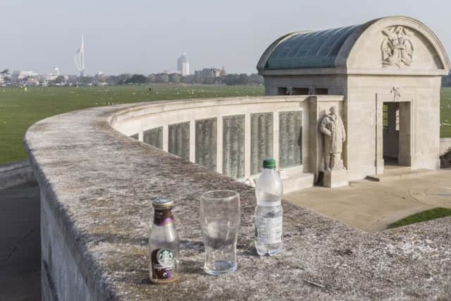 Southsea Common was covered in litter this morning, and bottles and glasses were also left on the Naval War Memorial Picture: Nigel Willis