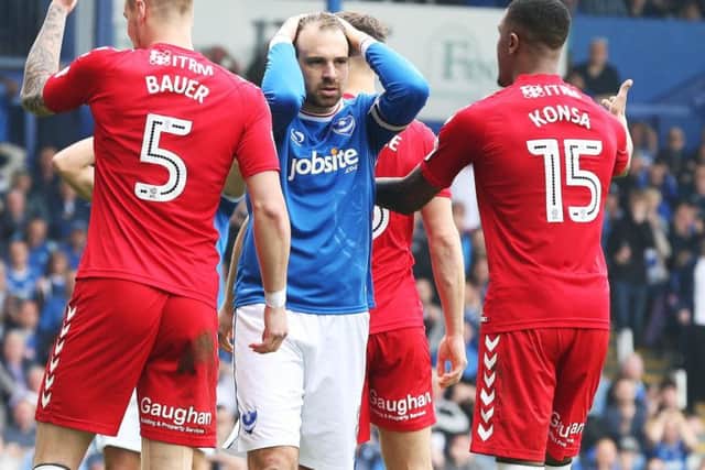 Brett Pitman holds his head in his hands after missing a golden opportunity to score in the 48th minute