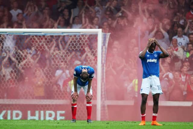 Smoke bombs were let off during Pompey's match against Charlton today. Picture: Joe Pepler