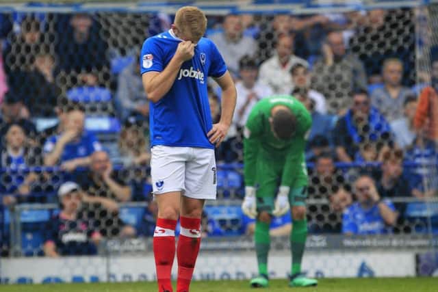 Jack Whatmough is gutted after Nicky Ajose nets against Pompey for what would be the decisive goal.