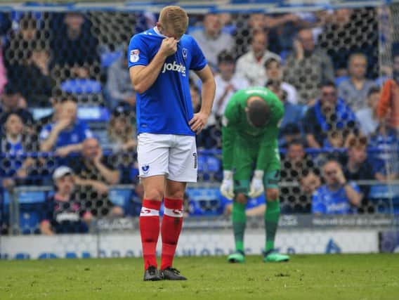 Jack Whatmough is gutted after Nicky Ajose nets against Pompey for what would be the decisive goal.
