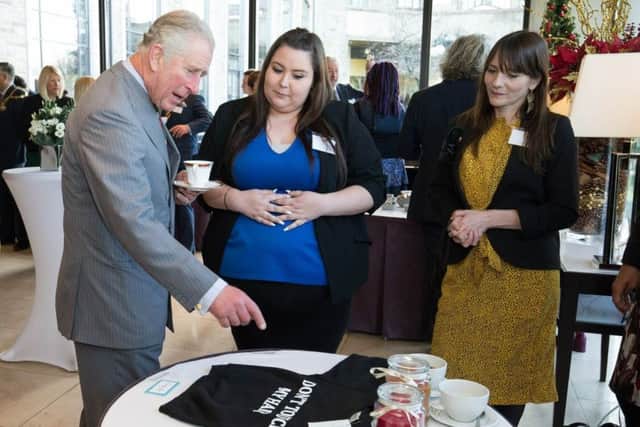 Carly Thompsett discusses her products with Prince Charles