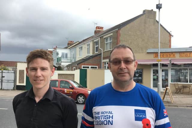 One of the CCTV camera in the background, with Ben Hanvey of Beeny's Coffee, in Tangier Road, Baffins, and resident Cliff Golledge. Picture: Ben Fishwick