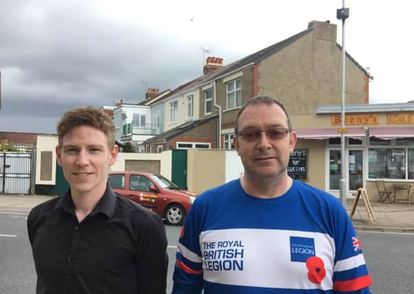 One of the CCTV camera in the background, with Ben Hanvey of Beeny's Coffee, in Tangier Road, Baffins, and resident Cliff Golledge.  Picture: Ben Fishwick