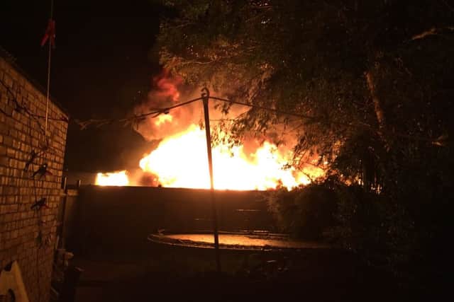The scene from garden of one of the homes hit by the arson last night