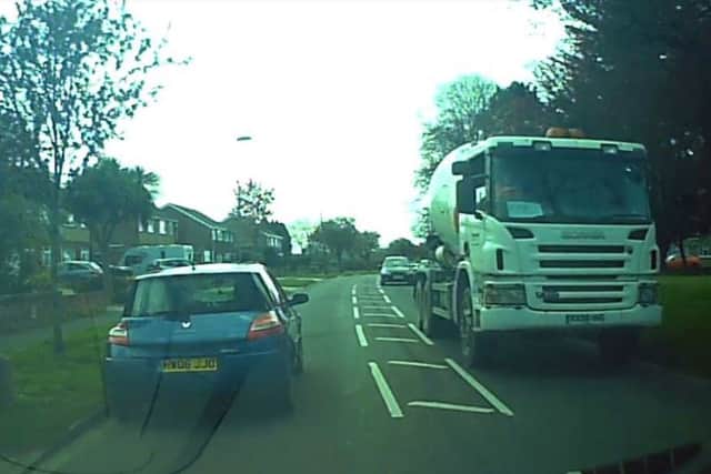 A lorry driving down Carisbrook Road