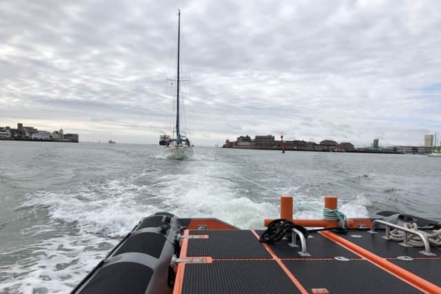 The yacht being towed to safety. Credit: Gafirs