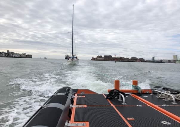 The yacht being towed to safety. Credit: Gafirs