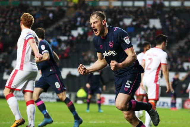 Matt Clarke celebrates his goal at MK Dons. Picture: Joe Pepler