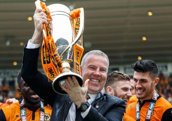 Kenny Jackett won the League One title with Wolves in the 2013-14 season