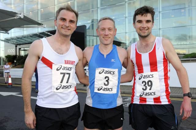 Chris Spinks, left, winner James Baker, centre, and Tom Stevens. Picture: Malcolm Wells (180425-5889)