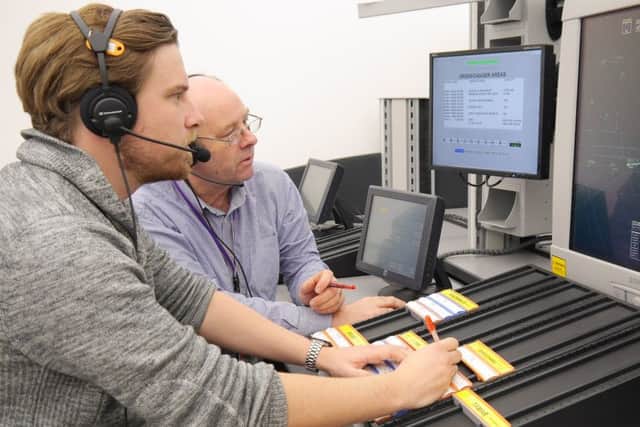 David Wright and his trainer at Nats air traffic control training facility