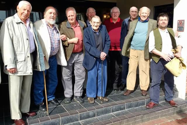 John Hartfree (centre in blue) celebrated his 94th birthday with former train drivers.