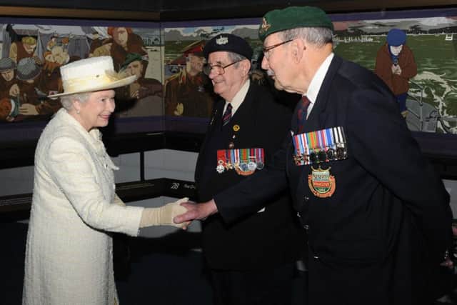 Eddie Wallace being presented to the Queen at the D-Day Museum, Southsea, in April 2009. Picture: David Parker/Daily Mail/PA Wire