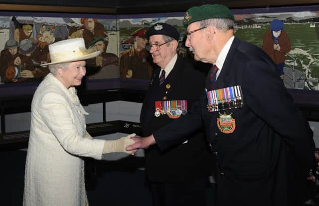 Eddie Wallace being presented to the Queen at the D-Day Museum, Southsea, in April 2009. Picture: David Parker/Daily Mail/PA Wire
