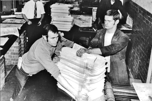 Quires (two dozen) of newspapers come off the presses at Stanhope Road for distribution.